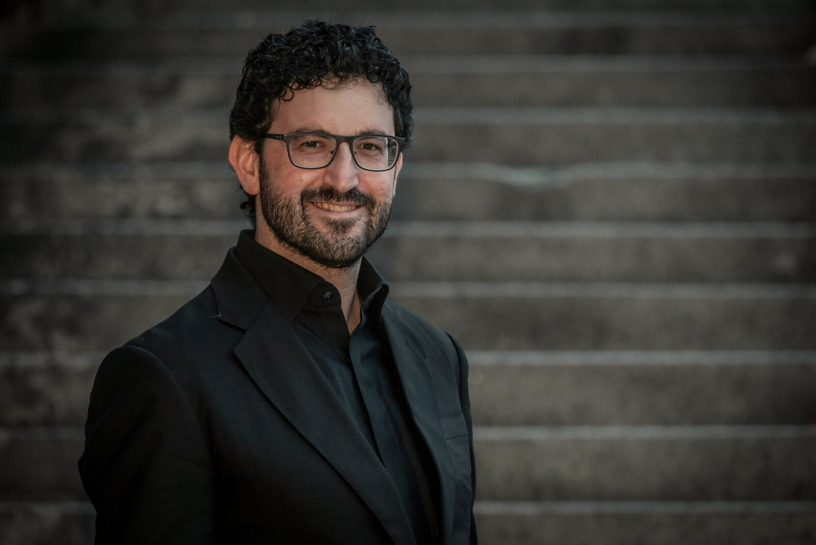 Ben Kazez on a stone staircase